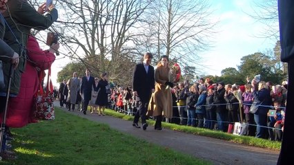 Watch Princess Charlotte refuse to let go of her flowers. Royal Family Attend Christmas Day Service