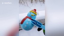 Chinese man uses snowball makers to form perfect snowmen and ducks