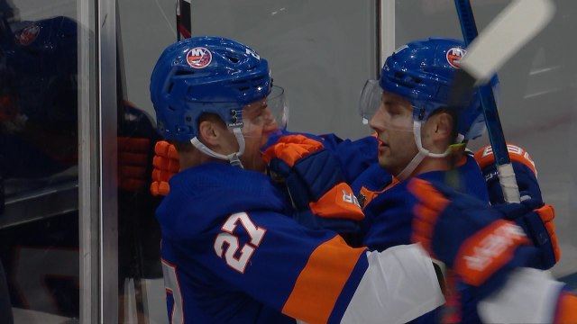 Derick Brassard catches Anders Lee's mouthguard, puts it back in place