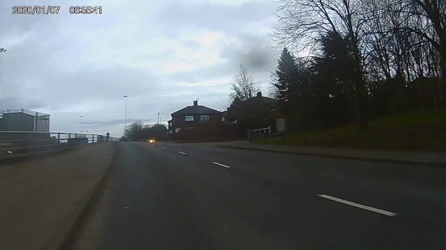 Watch moment cyclist narrowly avoids driver on wrong side of the road