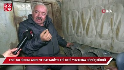 Eski su bidonlarını ve battaniyeleri kedi yuvasına dönüştürdü