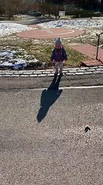 Toddler Discovers Her Own Shadow and Tries to Run Away