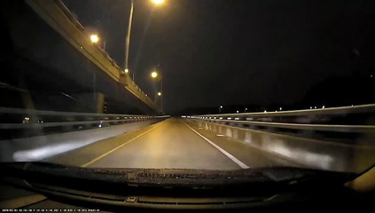 Driver Has a Scary Slide on Icy Bridge