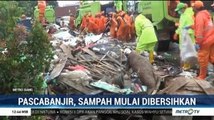 Tim PPSU Jakarta Bersihkan Sampah Sisa Banjir