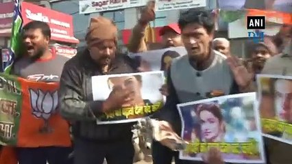 BJP Youth Wing puts black ink on Deepika Padukone’s poster during protest in Patna