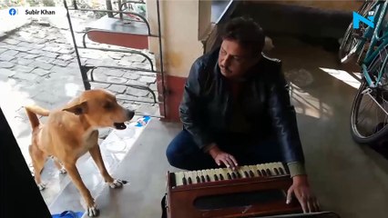 Dog sings 'Teri Meri Kahaani' along with man, has Ranu Mondal seen it?