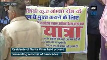 Residents of Delhi’s Sarita Vihar protest to remove barricades due to CAA, NRC demonstrations