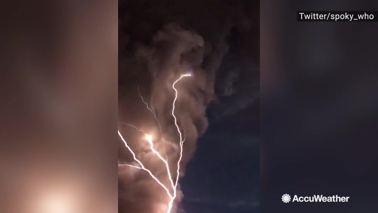Incredible lighting strike scatters across night sky