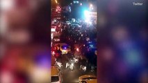 Tehran locals are shot with rubber bullets as they watch protests