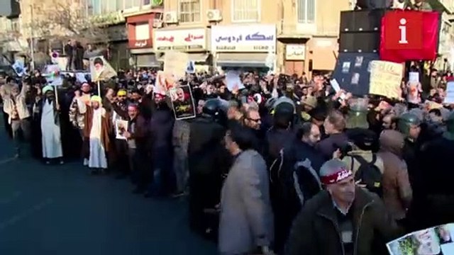 Iranian protesters burn British flags and chant 'death to England' after detention of British ambassador