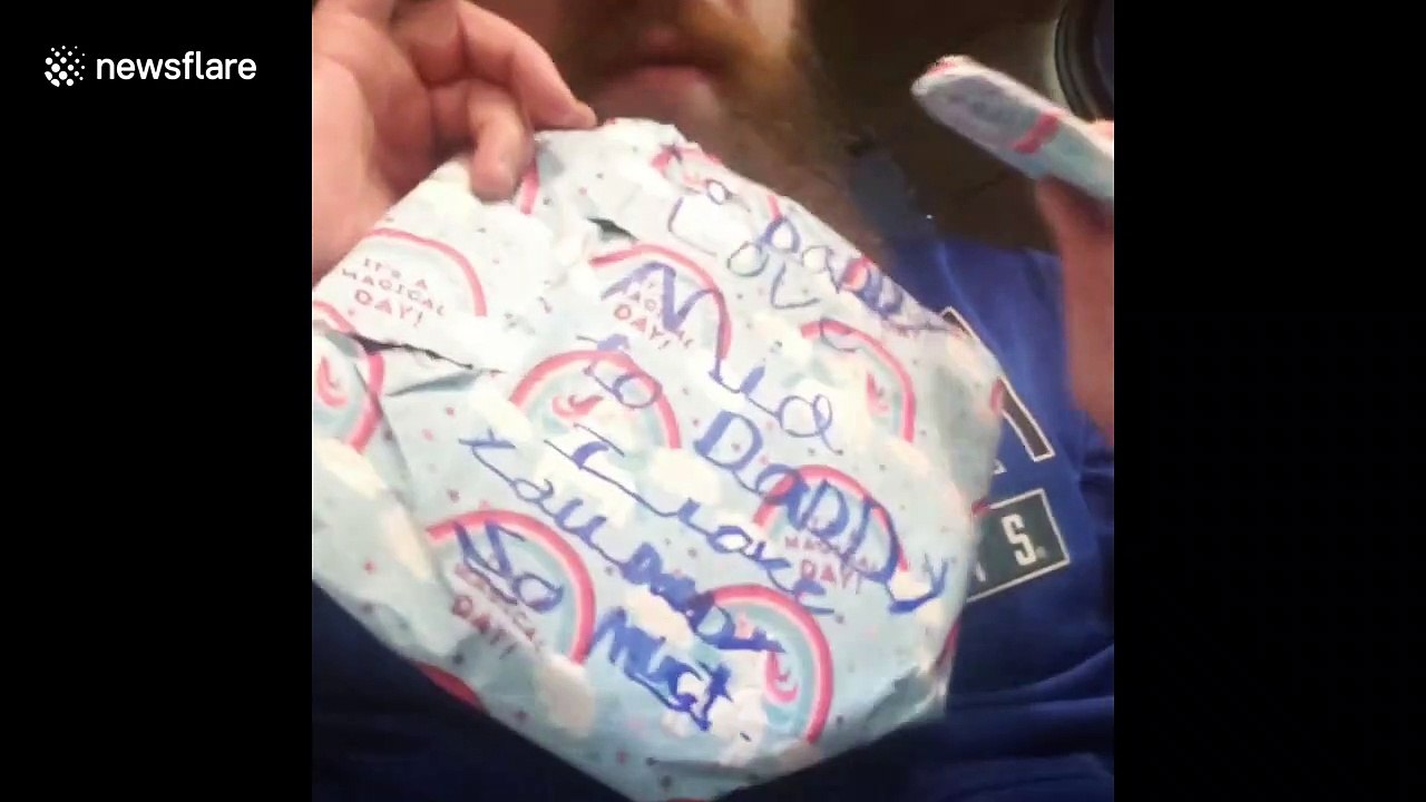 Homeless US dad to 'keep pushing' after opening 'No1 Dad' gift from kids