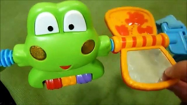 Review Bright Starts Hop Along Frog Car Seat Attachment Toy Bar