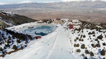 Ergan Dağı'nda kayak ve yamaç paraşütü keyfi bir arada