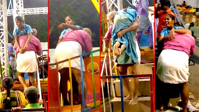 மாற்று திறனாளி மகளை தோளில் சுமந்து செல்லும் தந்தை