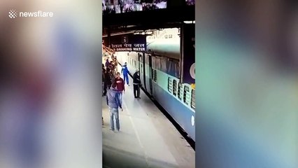 Alert railway guards save elderly man who fell while boarding moving train in eastern India