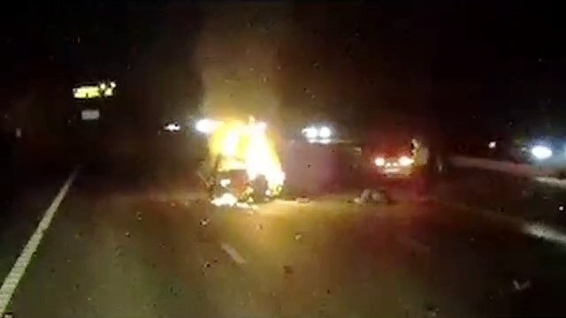 Hero driver saves woman from burning car