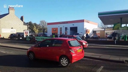 Extinction Rebellion activists block BP petrol station in Cambridge