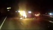 Incredible footage shows moment a hero lorry driver dragged a young woman from a burning car - seconds before it exploded in a fireball