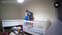 Boy Helps Brother out of Crib