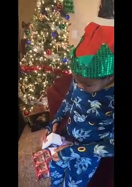 Boy Bamboozled by the Packaging