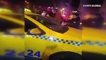 Taksici kolunu emniyet kemerine kilitleyip polise direndi