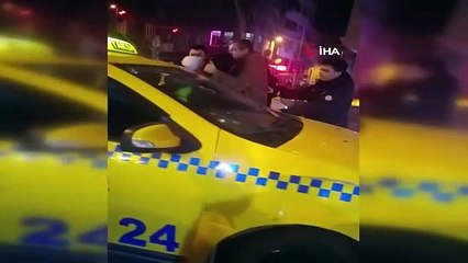 Polise direnen taksici kendini emniyet kemerine kilitledi