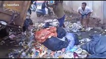 Indian sanitation workers pick up allegedly drunk man along with the garbage