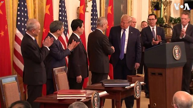 US President Trump Signs New Trade Agreement With China (1)