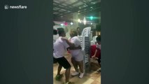Bizarre office game in Philippines is chair-stacking chaos