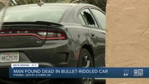 A man found dead in a bullet-riddled car