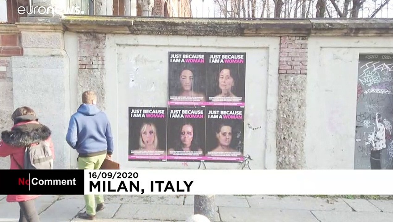 Merkel mit blauen Flecken im Gesicht: Anti-Gewalt-Kunst in Mailand