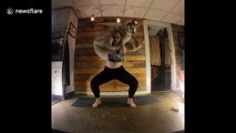Woman uses her dogs as weights in make-shift at-home gym