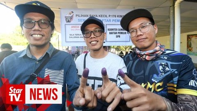 Triplets cause a 'stir' at Kimanis polling station