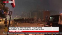 Lebanon: Anti-government protesters try to storm Parliament Square