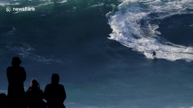 Brazilian surfer Felipe Cesarano flattened by monster 60ft wave at Nazare