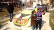 Boy makes impressive sports car out of snow in northern India