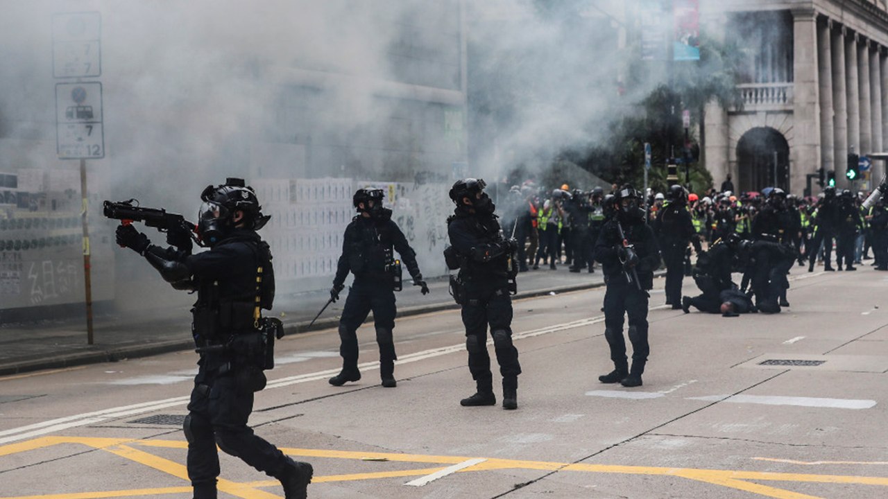 Tear gas and arrests as Hong Kong rally for universal suffrage descends into chaos