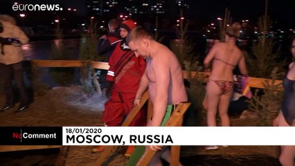 Russians mark Epiphany with plunge into icy water