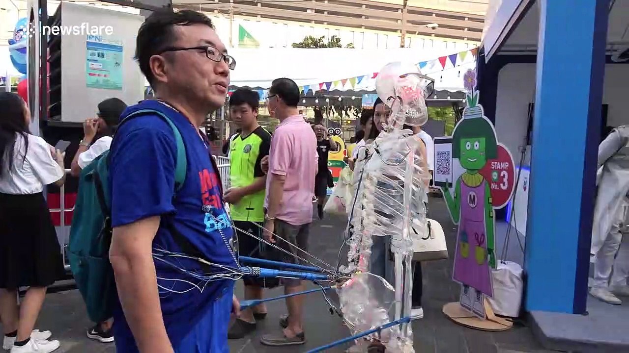 Japanese inventor shows off dancing skeleton suit at Thai tech convention