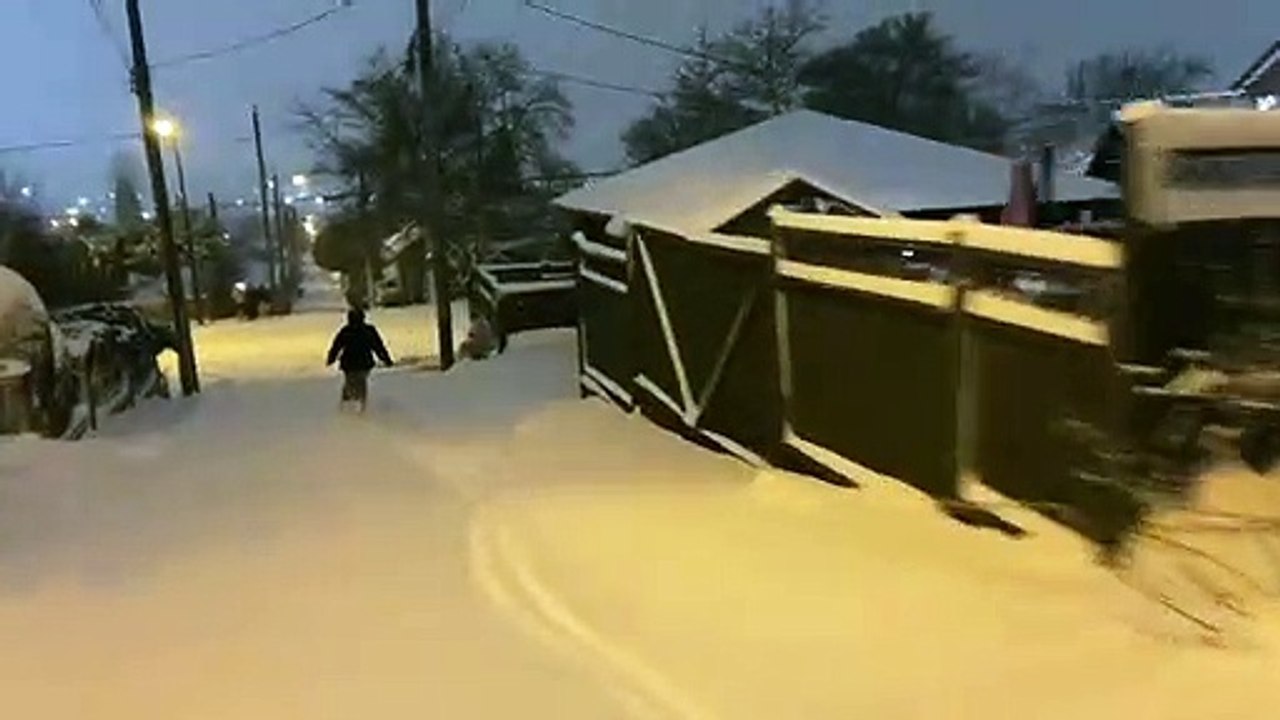 Heavy Snow Turns Streets Into Ski Slopes