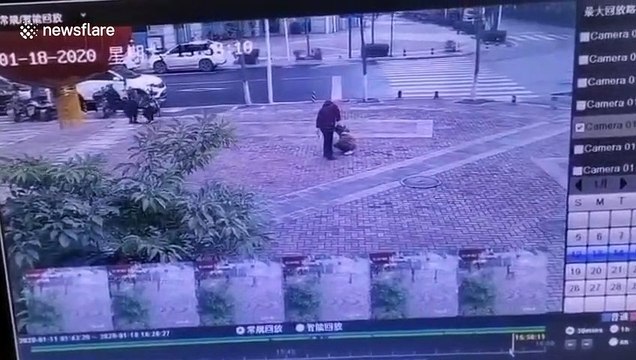 Manhole explodes in China after girl drops firecrackers through cover
