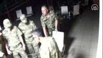 Asker kılığına girmiş FETÖ'cü hainlerin darbe gecesi görev dağılımı yaptıkları görüntüler ortaya çıktı
