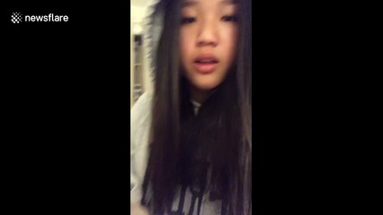 Hilarious fail as girl realizes weighted blanket is actually heavy when thrown over her head