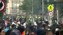 Protesters clash with police in Bogota during anti-govt demonstrations