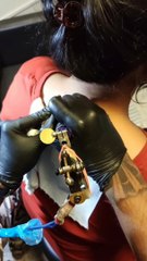 Nape shave and tattoo