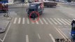 Unsuspecting Chinese biker luckily survives after being run over by truck