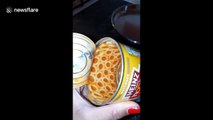 Spaghetti hoops lined up perfectly inside of tin can and it's inexplicably satisfying