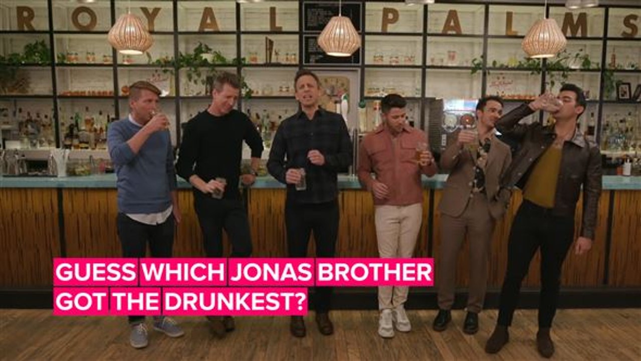 The Jonas Brothers get wasted playing drinking games with Seth Meyers