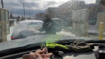 Canadian Clears Off Snow Covered Car