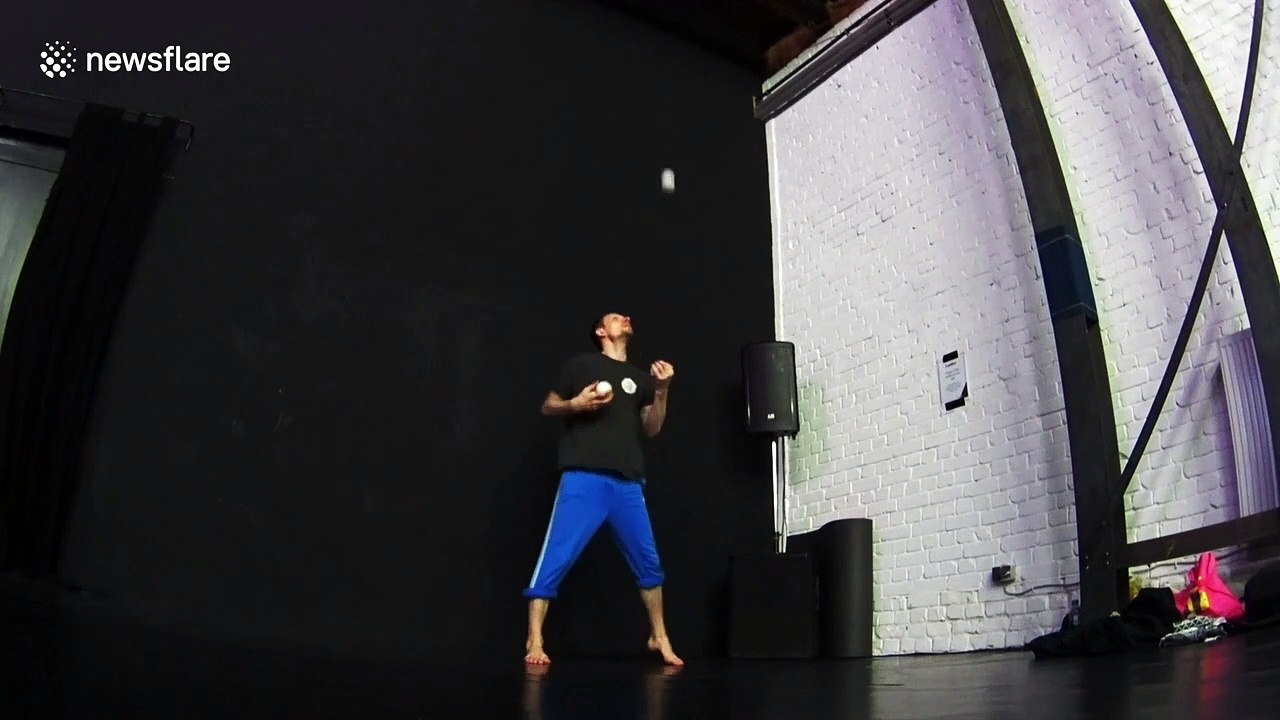 Professional Ukrainian juggler performs 'impossible' trick which sees him juggle four balls with only one foot